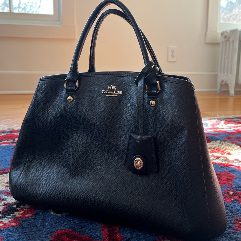 Black leather Coach handbag. Received as gift & only used once. See pictures